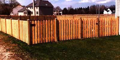 classic picket fence design by Elyria Fence