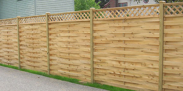 Good Neighbor Cedar Basketweave Fencing with lattice by Elyria Fence