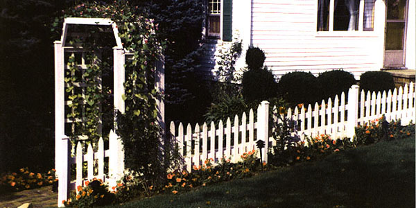 Reverse Runner Cedar Picket Fence with arbor built by Elyria Fence Company