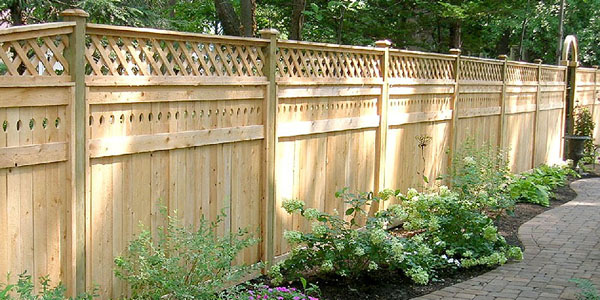 Good Neighbor Cedar Privacy Fencing with lattice by Elyria Fence