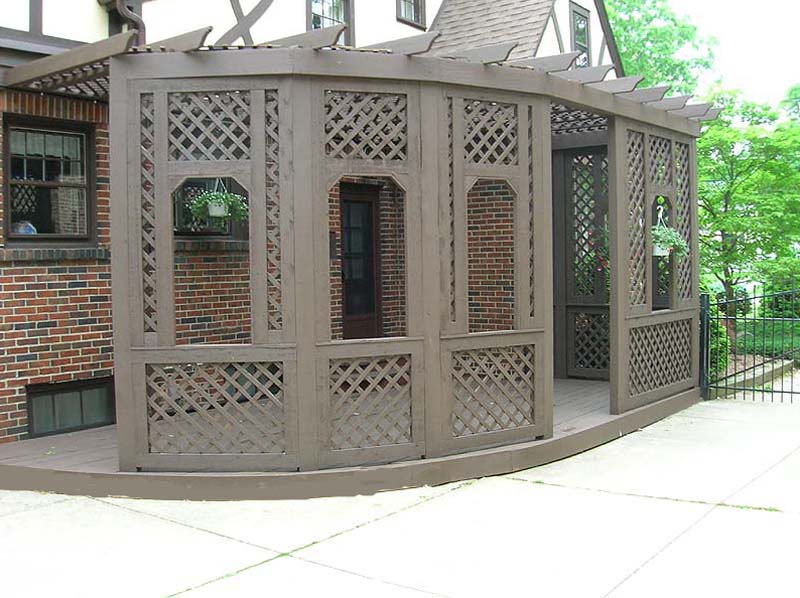 wood pergola with diagonal lattice by elyria fence