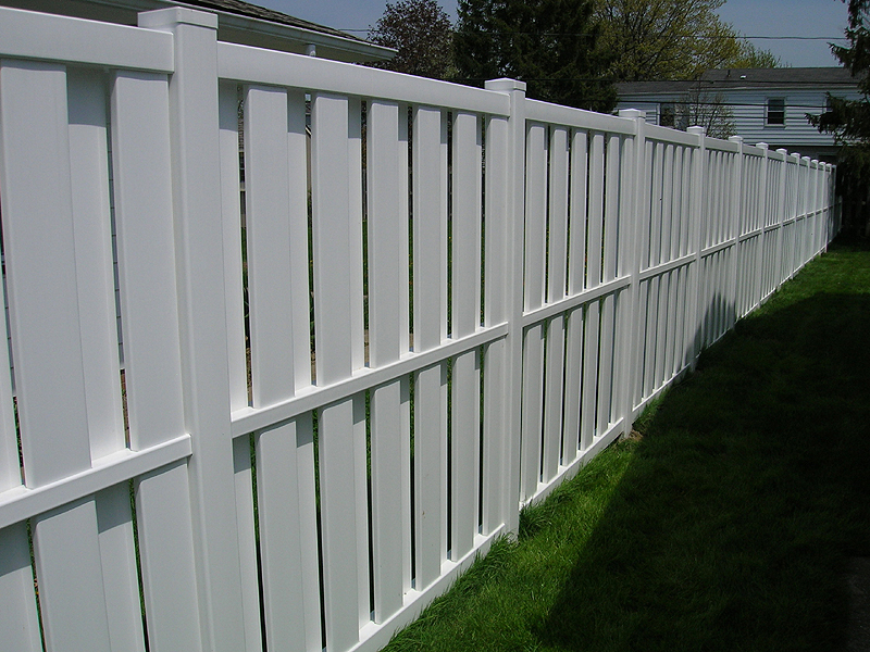 Vinyl Board on Board (Shadow box) Privacy Fence by Elyria Fence