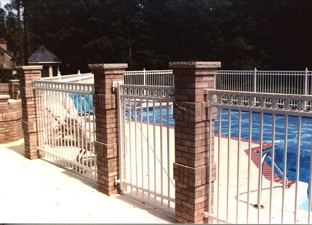 White Ornamental Aluminum Pool Fence by Elyria Fence