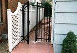 ornamental aluminum iron arched gate by Elyria Fence