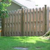 spaced white cedar wooden provincial fence with finial posts by elyria fence