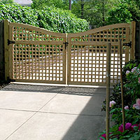 wood pergola with diagonal lattice by elyria fence