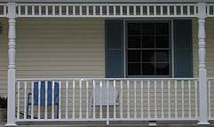 Vinyl railing by Elyria Fence