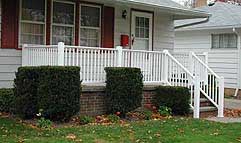 Vinyl railing by Elyria Fence