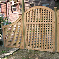 wood arched square lattice vine trellis by Elyria Fence