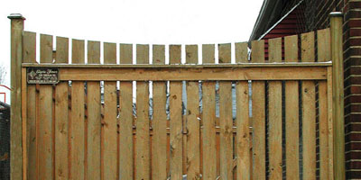 Sabre Scallop Cedar Picket Fencing by Elyria Fence