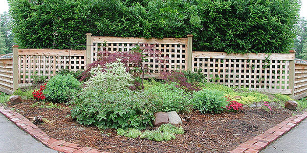 Good Neighbor Cedar lattice fence by Elyria Fence