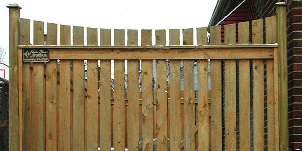 Good Neighbor Cedar Sabre Scallop Picket Fence by Elyria Fence