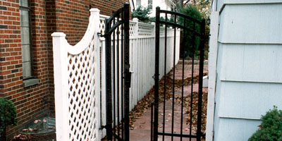 ornamental aluminum iron arched gate by Elyria Fence