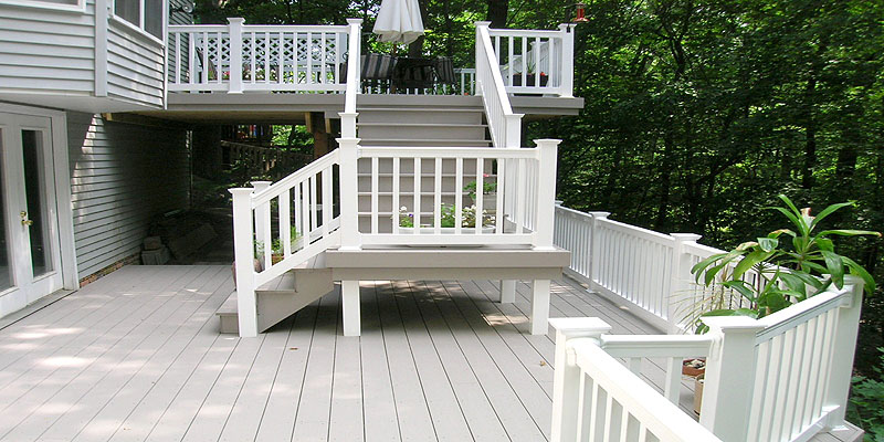 Azek Composite Deck with Vinyl Railing by Elyria Fence