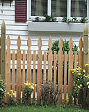 spaced white cedar wooden provincial fence with finial posts by elyria fence