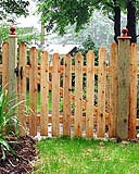 spaced scalloped white cedar wooden classic fence by elyria fence