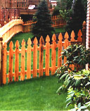 spaced white cedar wooden imperial picket fence by elyria fence