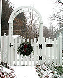 sabre scalloped white cedar wooden picket fence with arbor & gate by elyria fence