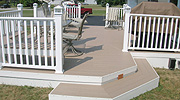 Composite Deck with vinyl railing by Elyria Fence