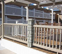 Faux Stone Pillars with vinyl railing