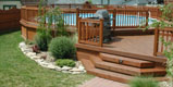 Wooden Pool Deck by Elyria Fence