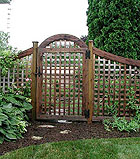 Arched Square Lattice Gate With Scalloped Square Lattice Fence by Elyria Fence